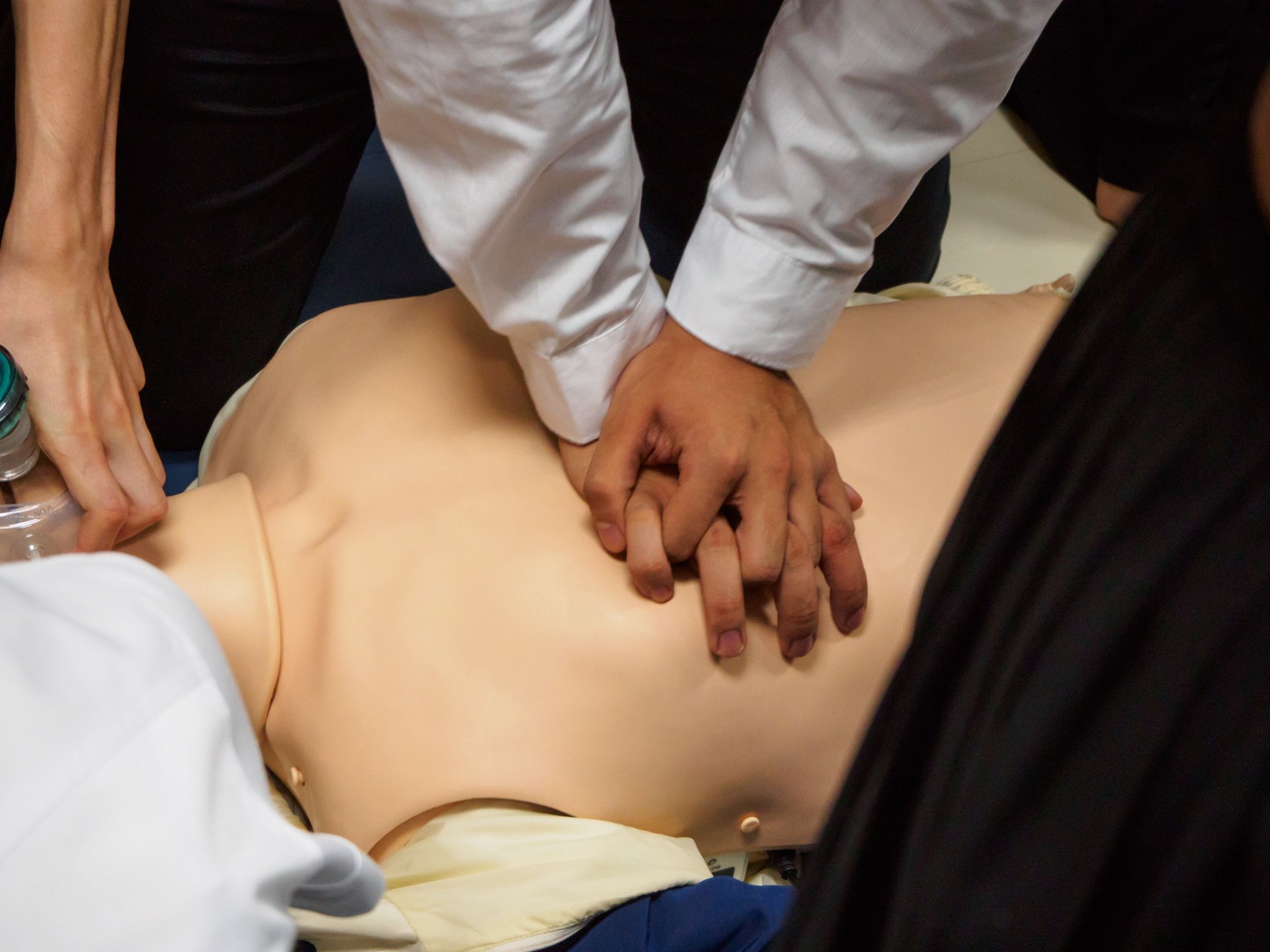 Medical students practicing basic life support